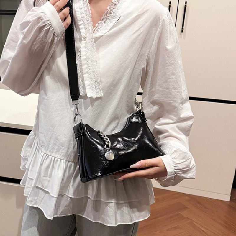 حقيبة حفاضات جلدية فاخرة للسيد - مراجعة Luxury Bags Paris وسعره