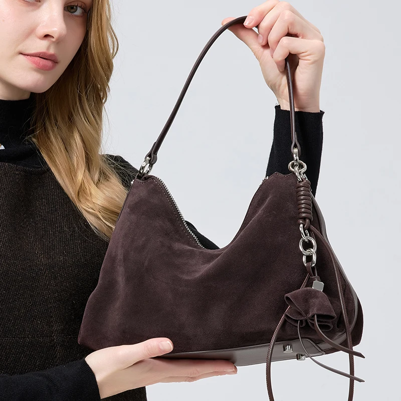 حقيبة يد نسائية من الجلد الطبي - مراجعة Half Moon Bag Suede وسعره