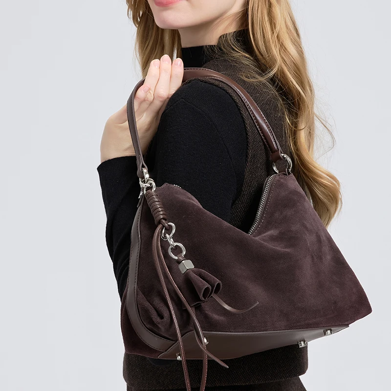 حقيبة يد نسائية من الجلد الطبي - مراجعة Half Moon Bag Suede وسعره