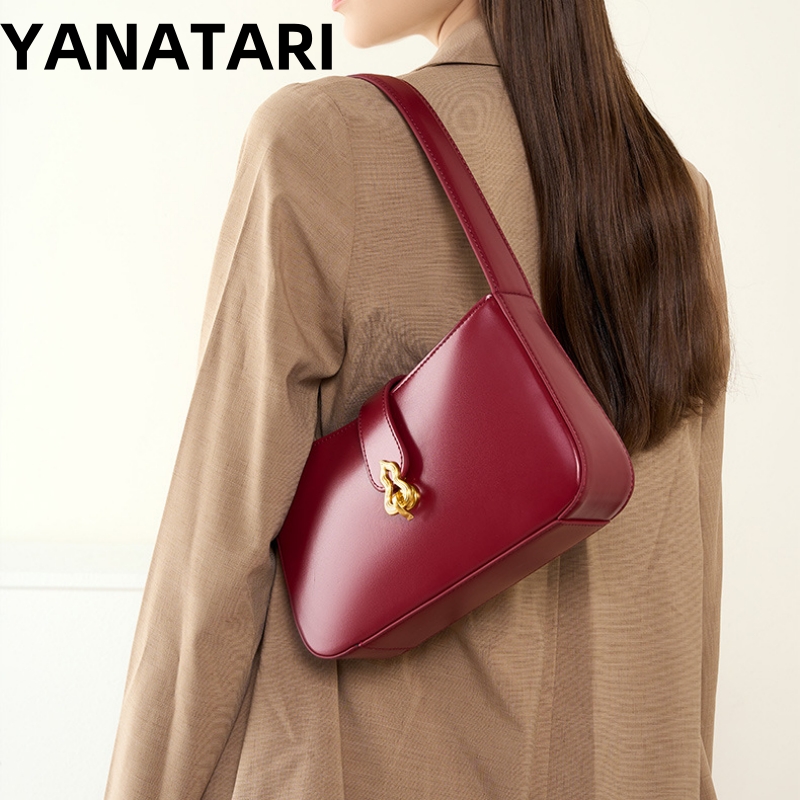 حقيبة ياناتاري الفاخرة المصممة - مراجعة Half Moon Bag Suede وسعره