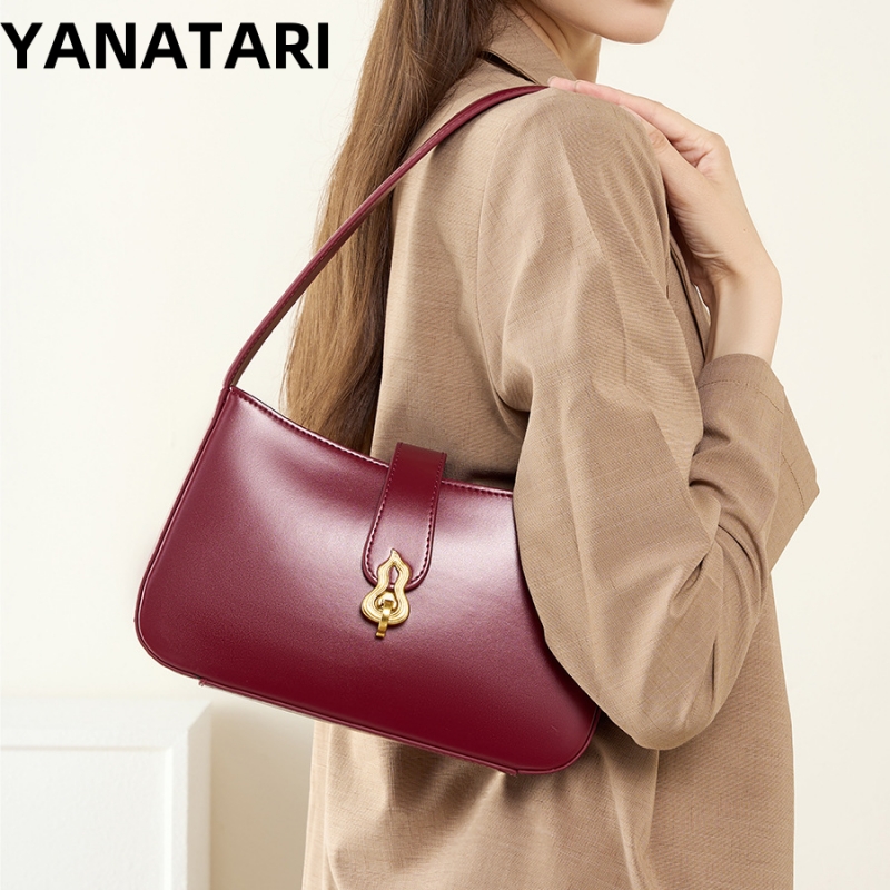 حقيبة ياناتاري الفاخرة المصممة - مراجعة Half Moon Bag Suede وسعره